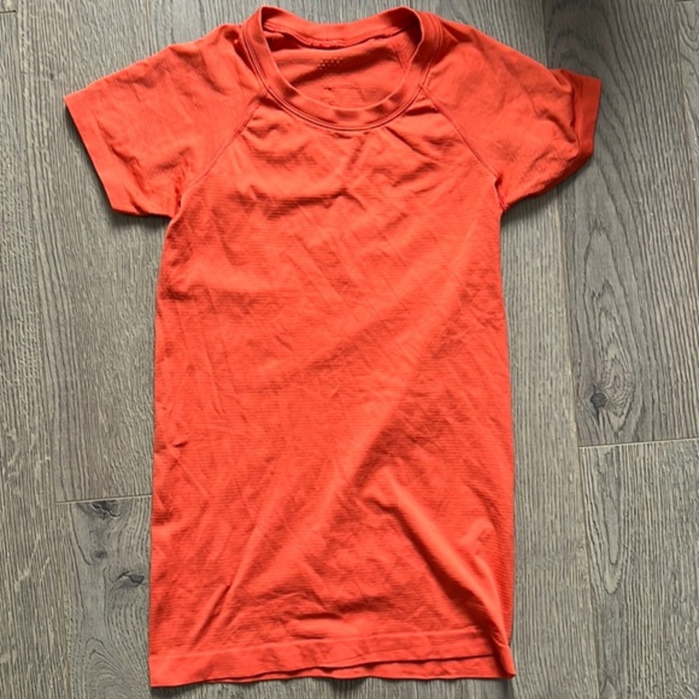 lululemon athletica Women's Short Sleeve Tee in Bright Orange